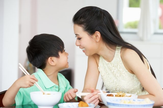 Mother and son enjoying progressive dinner together